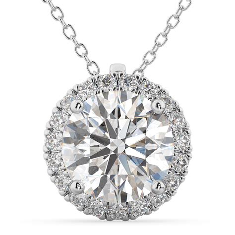 Diamond halo pendant .